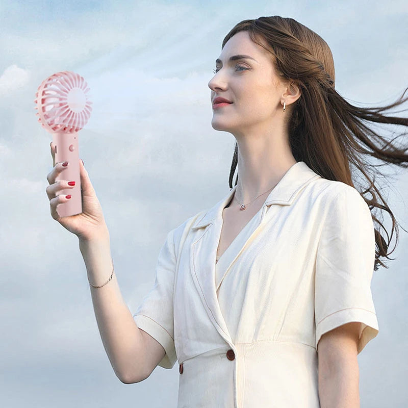 Portable USB Rechargeable Mini Fan – Handheld & Desktop Cooling for Travel or Outdoors